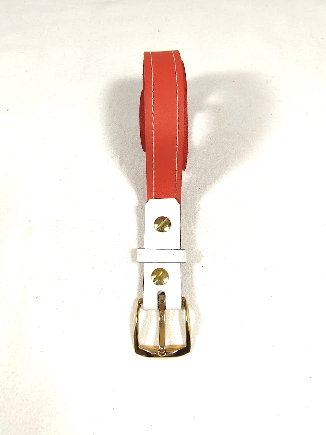 Ceinture pour Elle, en cuir orange et blanc, boucle m&eacute;tal dor&eacute;.